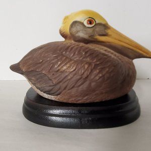 Pelican Sitting On Oval Wood Base Vintage 3 1/4" Tall